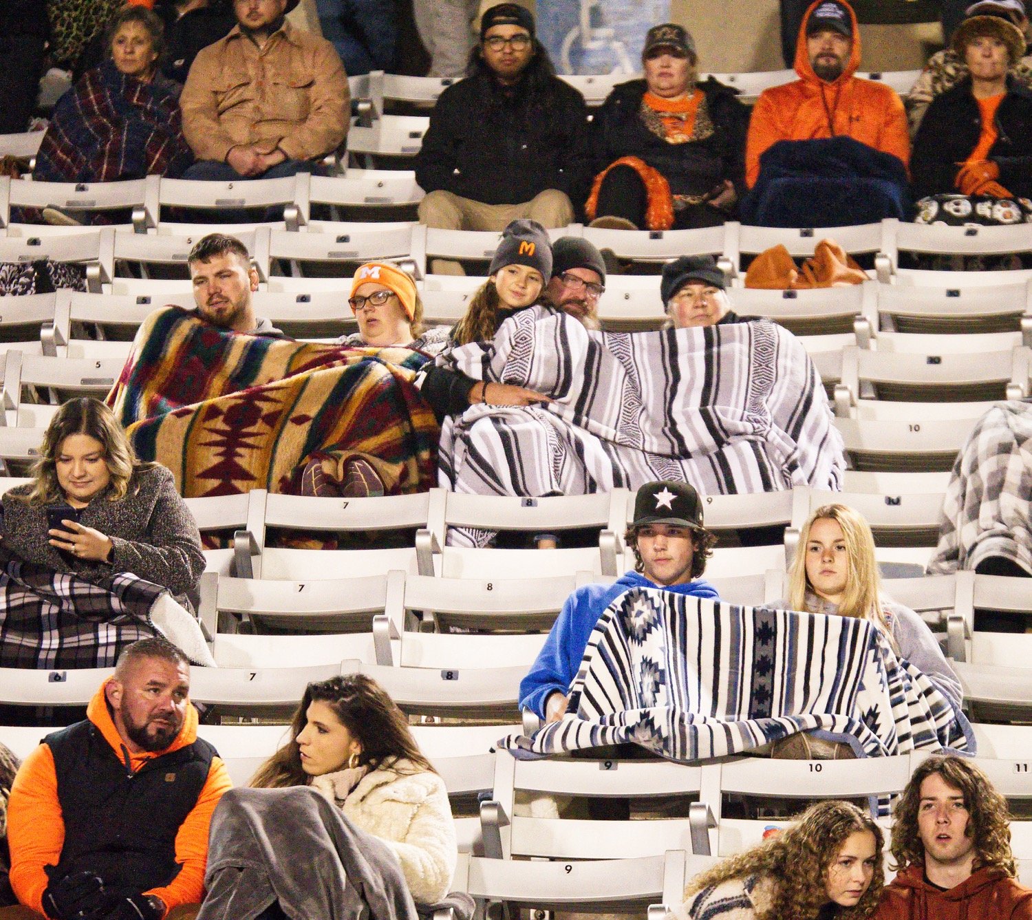 It was a chilly night in Mineola, but these Yellowjacket fans came prepared. [See what else unfolded Friday.]